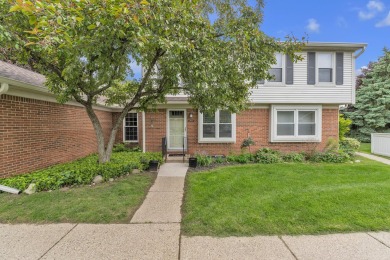 Beautifully updated townhome w/ Canadian maple hardwood floors on Georgetown Country Club in Michigan - for sale on GolfHomes.com, golf home, golf lot