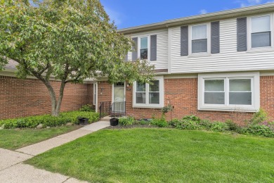 Beautifully updated townhome w/ Canadian maple hardwood floors on Georgetown Country Club in Michigan - for sale on GolfHomes.com, golf home, golf lot