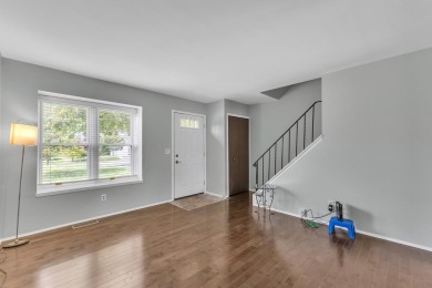 Beautifully updated townhome w/ Canadian maple hardwood floors on Georgetown Country Club in Michigan - for sale on GolfHomes.com, golf home, golf lot