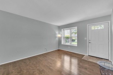 Beautifully updated townhome w/ Canadian maple hardwood floors on Georgetown Country Club in Michigan - for sale on GolfHomes.com, golf home, golf lot