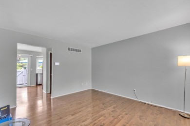 Beautifully updated townhome w/ Canadian maple hardwood floors on Georgetown Country Club in Michigan - for sale on GolfHomes.com, golf home, golf lot