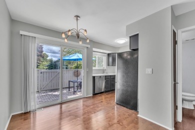 Beautifully updated townhome w/ Canadian maple hardwood floors on Georgetown Country Club in Michigan - for sale on GolfHomes.com, golf home, golf lot