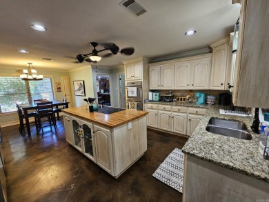 This stunning home truly has it all! Featuring 4 spacious on Foxwood Golf Club in Arkansas - for sale on GolfHomes.com, golf home, golf lot