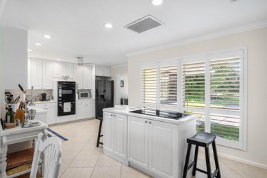 Enjoy resort-style living in this beautifully updated 3-bedroom on Quail Ridge Golf Course and Country Club in Florida - for sale on GolfHomes.com, golf home, golf lot