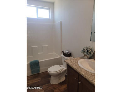 This is a beautiful new build 3 bedroom 2 bath home. Laminate on 3 Parks Fairways in Arizona - for sale on GolfHomes.com, golf home, golf lot