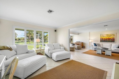 Enjoy resort-style living in this beautifully updated 3-bedroom on Quail Ridge Golf Course and Country Club in Florida - for sale on GolfHomes.com, golf home, golf lot