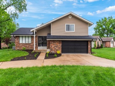 Welcome to this beautifully maintained split-level home on Lake Saint Louis Par 3 in Missouri - for sale on GolfHomes.com, golf home, golf lot