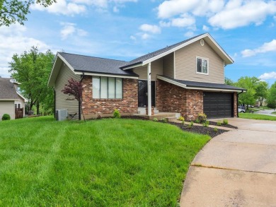Welcome to this beautifully maintained split-level home on Lake Saint Louis Par 3 in Missouri - for sale on GolfHomes.com, golf home, golf lot