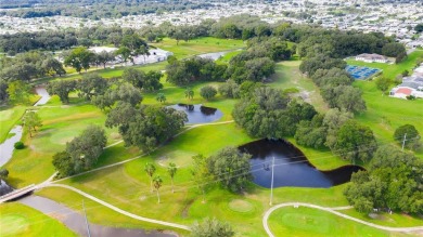 Escape the cold and embrace the Florida sunshine in Betmar Acres on Betmar Acres Golf Club in Florida - for sale on GolfHomes.com, golf home, golf lot