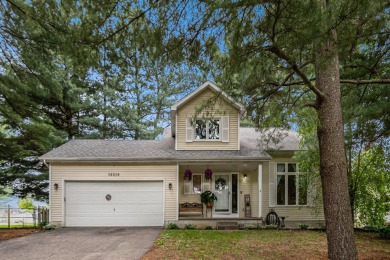 Stunning 2-story home features vaulted ceilings and a spacious on Hankerd Hills Golf Course in Michigan - for sale on GolfHomes.com, golf home, golf lot