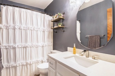 Stunning 2-story home features vaulted ceilings and a spacious on Hankerd Hills Golf Course in Michigan - for sale on GolfHomes.com, golf home, golf lot