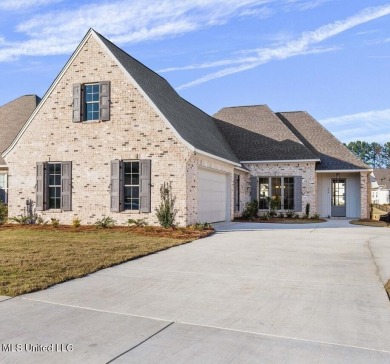 Welcome to this stunning new construction lakefront home in Lake on Lake Caroline Golf Club in Mississippi - for sale on GolfHomes.com, golf home, golf lot