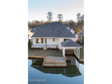 Welcome to this stunning new construction lakefront home in Lake on Lake Caroline Golf Club in Mississippi - for sale on GolfHomes.com, golf home, golf lot