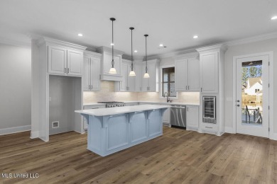 Welcome to this stunning new construction lakefront home in Lake on Lake Caroline Golf Club in Mississippi - for sale on GolfHomes.com, golf home, golf lot