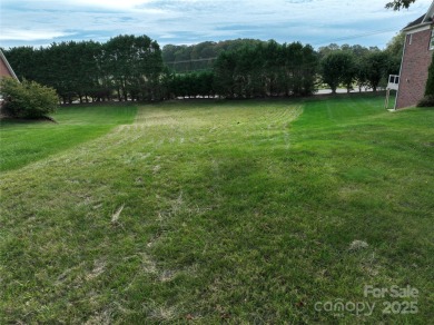 Large, cleared, gently sloping lot in prestigious Rock Barn on Rock Barn Golf and Spa in North Carolina - for sale on GolfHomes.com, golf home, golf lot