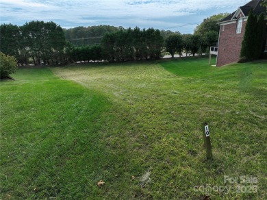 Large, cleared, gently sloping lot in prestigious Rock Barn on Rock Barn Golf and Spa in North Carolina - for sale on GolfHomes.com, golf home, golf lot
