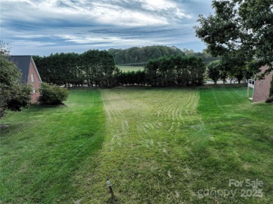 Large, cleared, gently sloping lot in prestigious Rock Barn on Rock Barn Golf and Spa in North Carolina - for sale on GolfHomes.com, golf home, golf lot