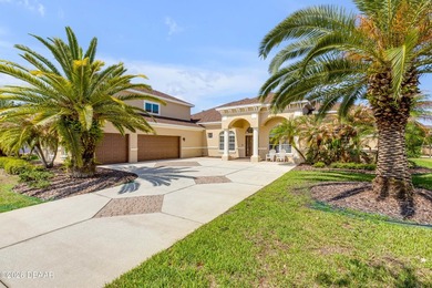 Experience lakeside living in this magnificent lakefront home in on Venetian Bay Golf Course in Florida - for sale on GolfHomes.com, golf home, golf lot