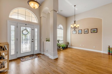 Experience lakeside living in this magnificent lakefront home in on Venetian Bay Golf Course in Florida - for sale on GolfHomes.com, golf home, golf lot