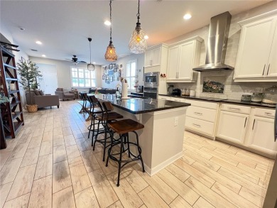 Welcome home to this beautiful one story home on a corner lot on Orange County National Golf Center and Lodge in Florida - for sale on GolfHomes.com, golf home, golf lot