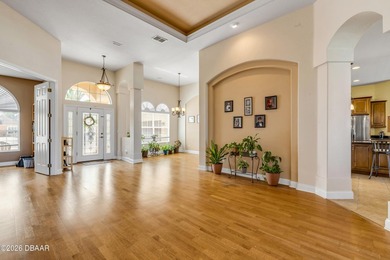 Experience lakeside living in this magnificent lakefront home in on Venetian Bay Golf Course in Florida - for sale on GolfHomes.com, golf home, golf lot