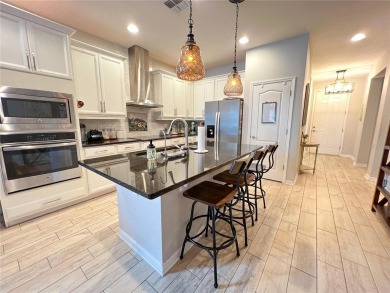 Welcome home to this beautiful one story home on a corner lot on Orange County National Golf Center and Lodge in Florida - for sale on GolfHomes.com, golf home, golf lot
