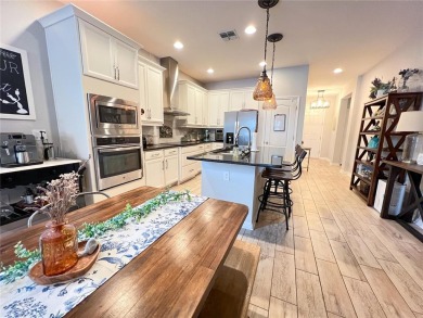 Welcome home to this beautiful one story home on a corner lot on Orange County National Golf Center and Lodge in Florida - for sale on GolfHomes.com, golf home, golf lot