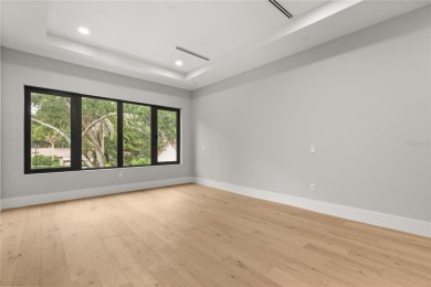 Exquisite new construction by LUIH Homes, this architectural on Dubsdread Golf Course in Florida - for sale on GolfHomes.com, golf home, golf lot