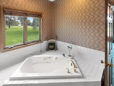 This stunning original-owner Rambler offers over 5,000 square on Majestic Oaks Golf Club  in Minnesota - for sale on GolfHomes.com, golf home, golf lot