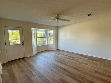 Located just a short golf cart ride to the beach, this on  in Florida - for sale on GolfHomes.com, golf home, golf lot