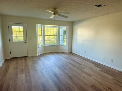 Located just a short golf cart ride to the beach, this on  in Florida - for sale on GolfHomes.com, golf home, golf lot