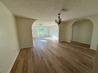 Located just a short golf cart ride to the beach, this on  in Florida - for sale on GolfHomes.com, golf home, golf lot