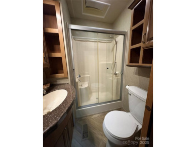 Spacious RV on deeded lot inside *BSR*. Boat & golf cart on Old North State Club at Uwharrie Point Golf community in North Carolina - for sale on GolfHomes.com, golf home, golf lot