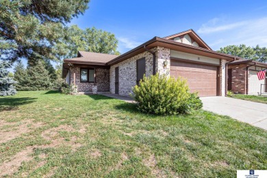 Welcome to desirable Wellington Greens! This end-unit ranch on Wellington Greens Golf Course in Nebraska - for sale on GolfHomes.com, golf home, golf lot