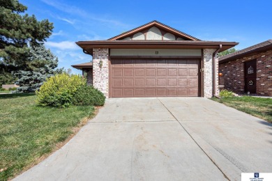 Welcome to desirable Wellington Greens! This end-unit ranch on Wellington Greens Golf Course in Nebraska - for sale on GolfHomes.com, golf home, golf lot