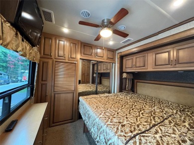 Spacious RV on deeded lot inside *BSR*. Boat & golf cart on Old North State Club at Uwharrie Point Golf community in North Carolina - for sale on GolfHomes.com, golf home, golf lot