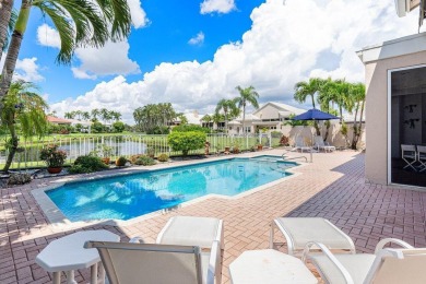 Soaring two-story ceiling heights greet you upon entering this on Polo Club of Boca Raton in Florida - for sale on GolfHomes.com, golf home, golf lot