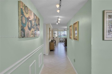 *Welcome to this charming 2-bedroom, 2-bathroom condo in the on Sunrise Lakes Phase III in Florida - for sale on GolfHomes.com, golf home, golf lot