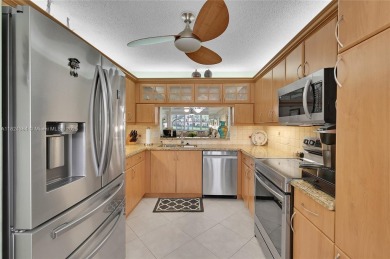 *Welcome to this charming 2-bedroom, 2-bathroom condo in the on Sunrise Lakes Phase III in Florida - for sale on GolfHomes.com, golf home, golf lot