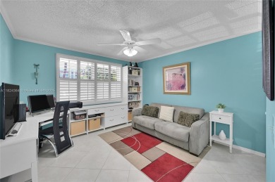 *Welcome to this charming 2-bedroom, 2-bathroom condo in the on Sunrise Lakes Phase III in Florida - for sale on GolfHomes.com, golf home, golf lot