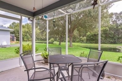 This immaculate home shows wonderfully and sits on one of the on River Ridge Golf Club in Florida - for sale on GolfHomes.com, golf home, golf lot