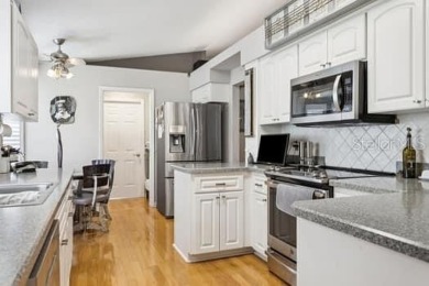 This immaculate home shows wonderfully and sits on one of the on River Ridge Golf Club in Florida - for sale on GolfHomes.com, golf home, golf lot