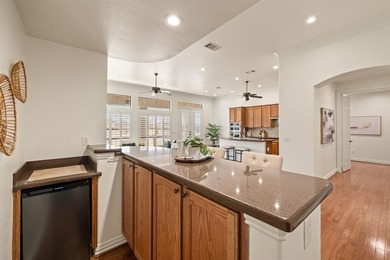 Experience elevated living in this stunning single-story home on Wildhorse Golf Club of Robson Ranch in Texas - for sale on GolfHomes.com, golf home, golf lot