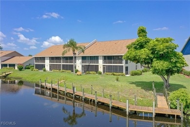 This inviting second-floor waterfront condo is located in the on Riverbend Golf and Country Club in Florida - for sale on GolfHomes.com, golf home, golf lot