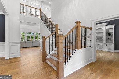 Welcome to this breathtaking four-sided brick estate, perfectly on Whitewater Creek in Georgia - for sale on GolfHomes.com, golf home, golf lot