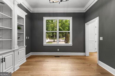 Welcome to this breathtaking four-sided brick estate, perfectly on Whitewater Creek in Georgia - for sale on GolfHomes.com, golf home, golf lot