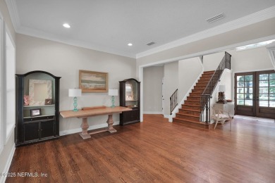 This stunning custom-built home offers an open yet traditional on The Palencia Club in Florida - for sale on GolfHomes.com, golf home, golf lot