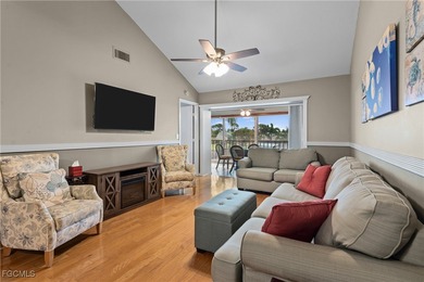 This inviting second-floor waterfront condo is located in the on Riverbend Golf and Country Club in Florida - for sale on GolfHomes.com, golf home, golf lot