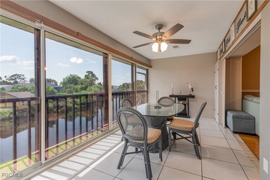 This inviting second-floor waterfront condo is located in the on Riverbend Golf and Country Club in Florida - for sale on GolfHomes.com, golf home, golf lot