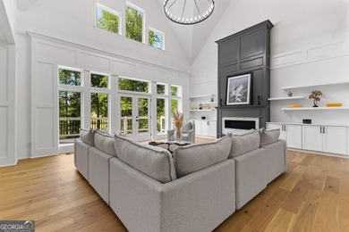 Welcome to this breathtaking four-sided brick estate, perfectly on Whitewater Creek in Georgia - for sale on GolfHomes.com, golf home, golf lot